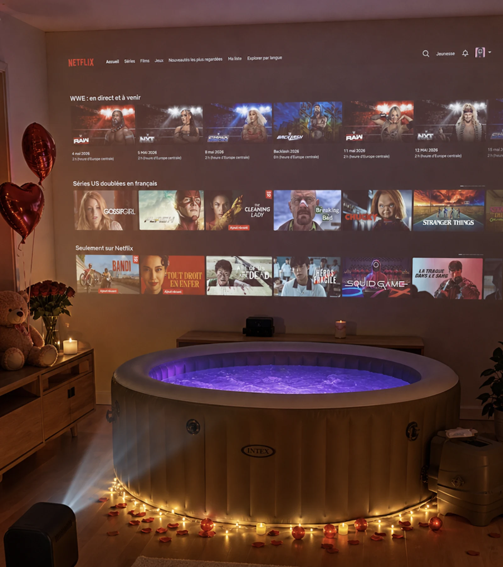 Jacuzzi Bullenn Spa installé en intérieur, ambiance soirée romantique avec bougies et plateau apéro